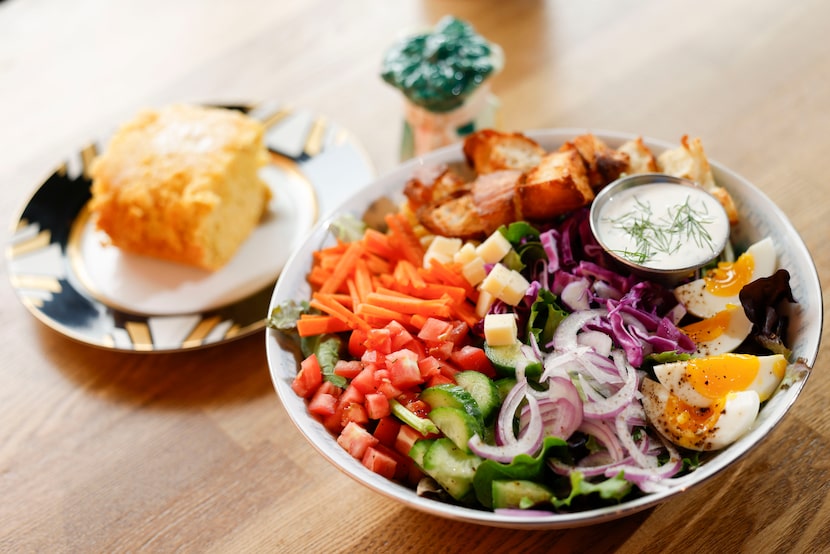 A house salad and cornbread, which will be a fixture on the otherwise rotating menu. The...