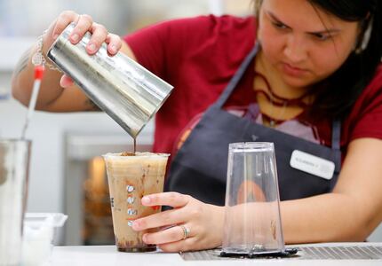 LiftOff Coffee and Tea "pilot" Alejandra Velasquez crafts a cold coffee inside Walmart...