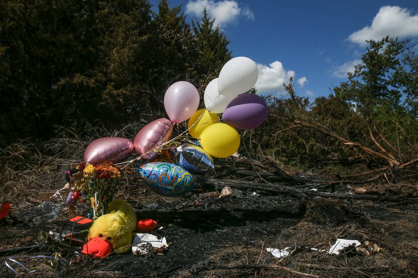 A makeshift memorial grew at the site where a 12-year-old girl died Wednesday when a...