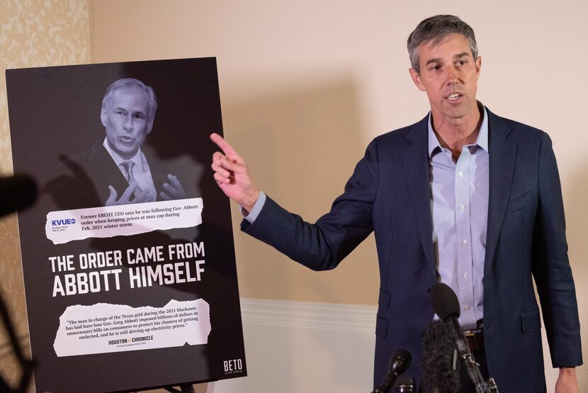 Beto O'Rourke, democratic candidate for Governor, stands next to an image of Texas Governor...