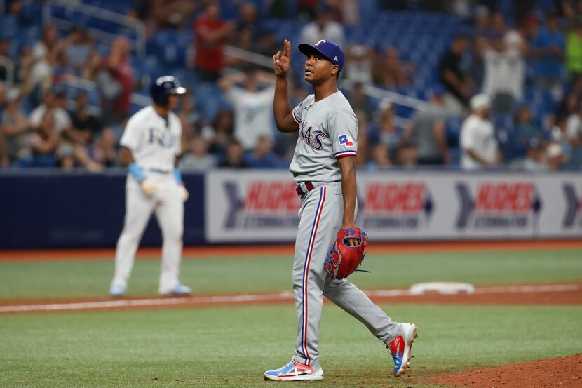 Texas Rangers relief pitcher Jose Leclerc reacts after the Rangers defeated the Tampa Bay...