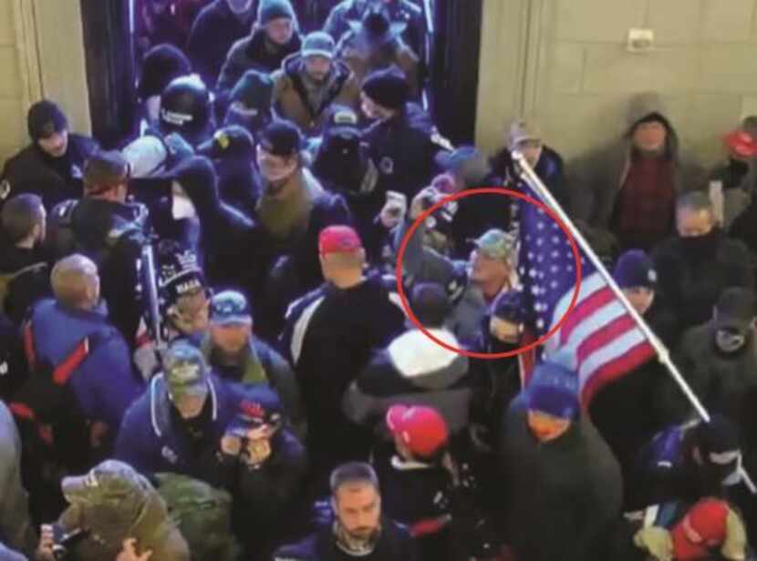 Jason Hyland, shown in red circle, was inside the U.S. Capitol on Jan. 6, according to...