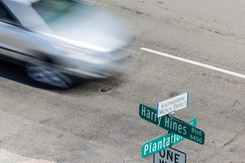 Traffic moves through Harry Hines Boulevard by the Southwestern Medical District on Tuesday....