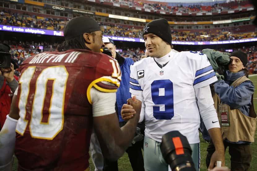 Washington Redskins quarterback Robert Griffin III (10) and Dallas Cowboys quarterback Tony...