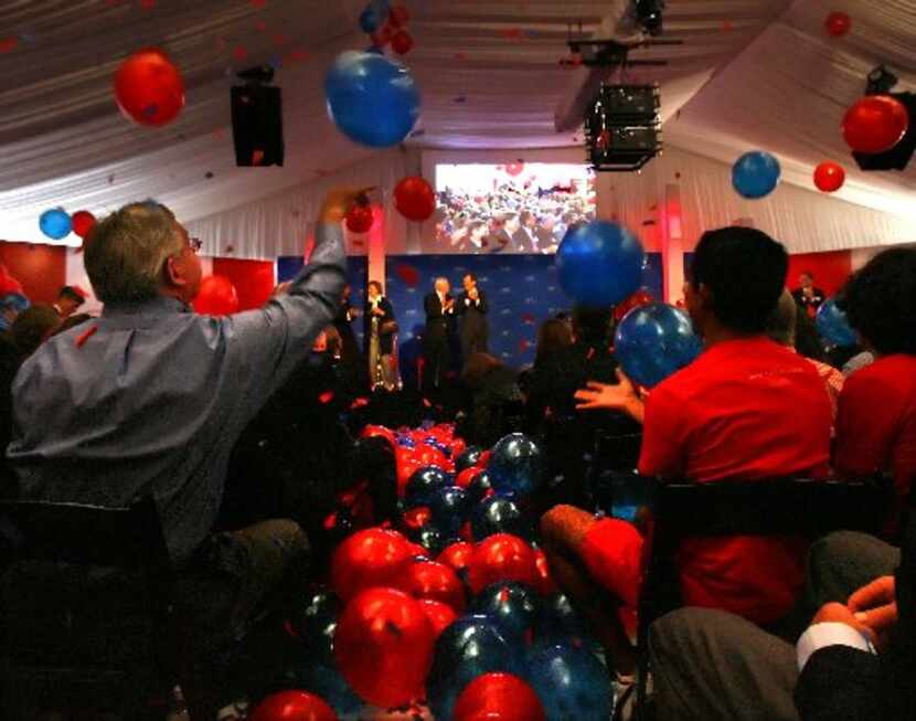 Architect Bryce Weigand (left) batted a balloon at a 2008 rally attended by SMU trustees,...