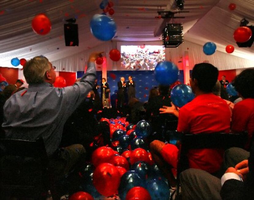 Architect Bryce Weigand (left) batted a balloon at a 2008 rally attended by SMU trustees,...