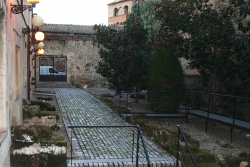 The ruins of a Jewish synagogue lie just outside guest rooms at the parador of Plasencia.