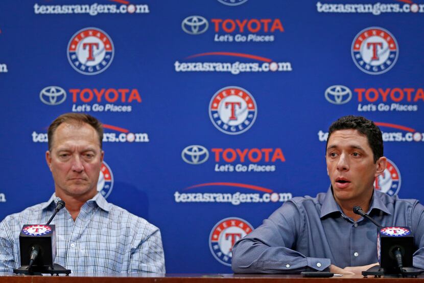 Texas Rangers President of Baseball Operations and General Manager Jon Daniels (right)...