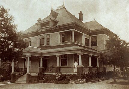 Kathryn Heard-Craig stands at the Heard-Craig House circa 1909. 