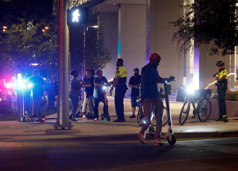 Dallas police officers made safety suggestions to scooter users in August 2019. 