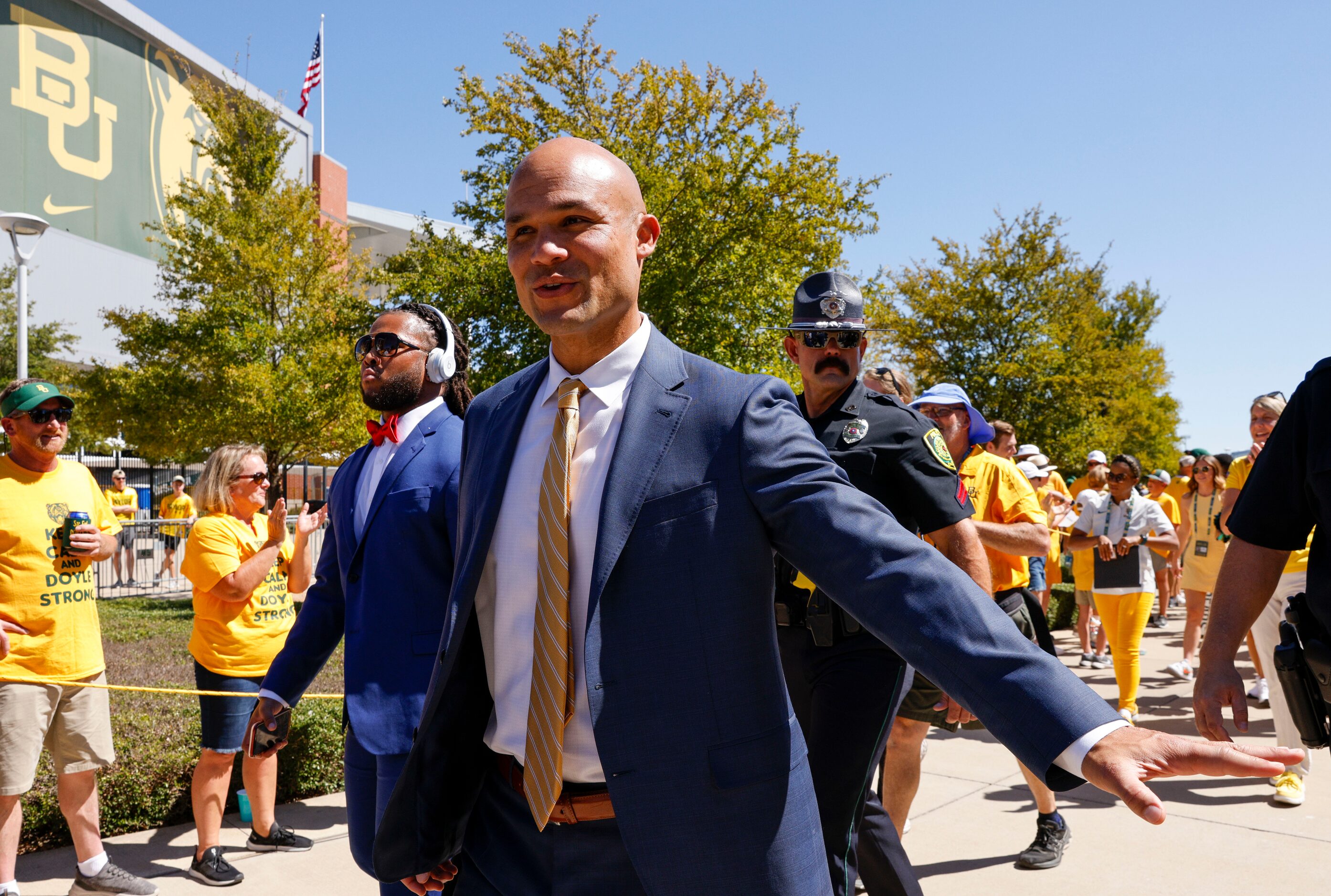 Baylor head coach Dave Aranda waves to fans during the Bear Walk before an NCAA football...