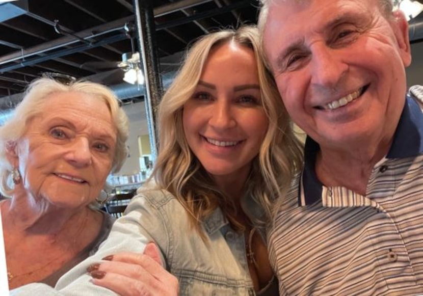 Katherine Schwab with her parents.