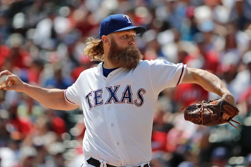 Texas Rangers starting pitcher Andrew Cashner works in the fifth inning against the New York...