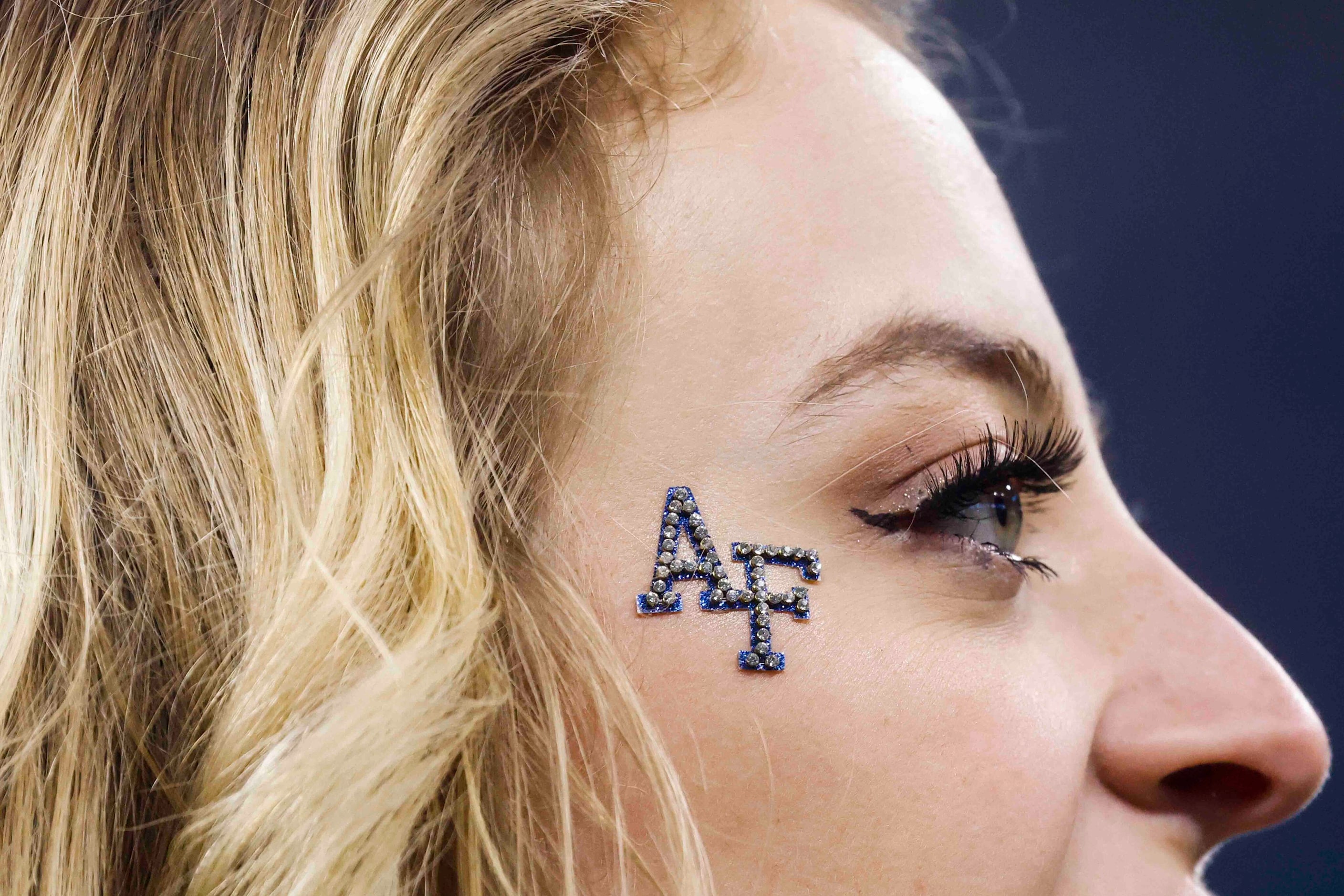 Air Force cheerleaders perform during the first half of an NCAA football game against Army...