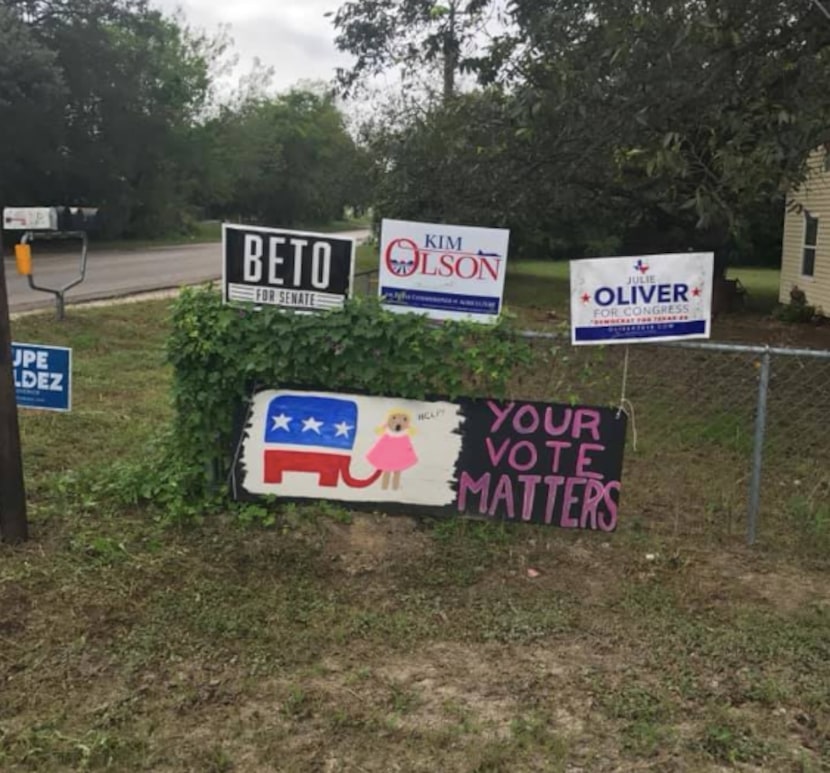 A Hamilton woman's sign was taken by police after Agriculture Commissioner Sid Miller said...