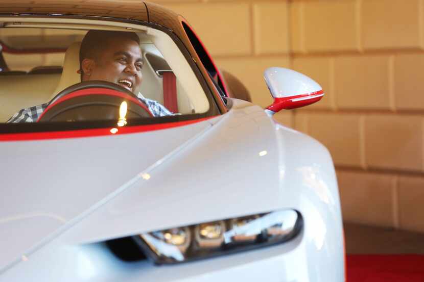 Vehicle owner Mayur Shree sits in the Bugatti Chiron during an event put on by Park Place...