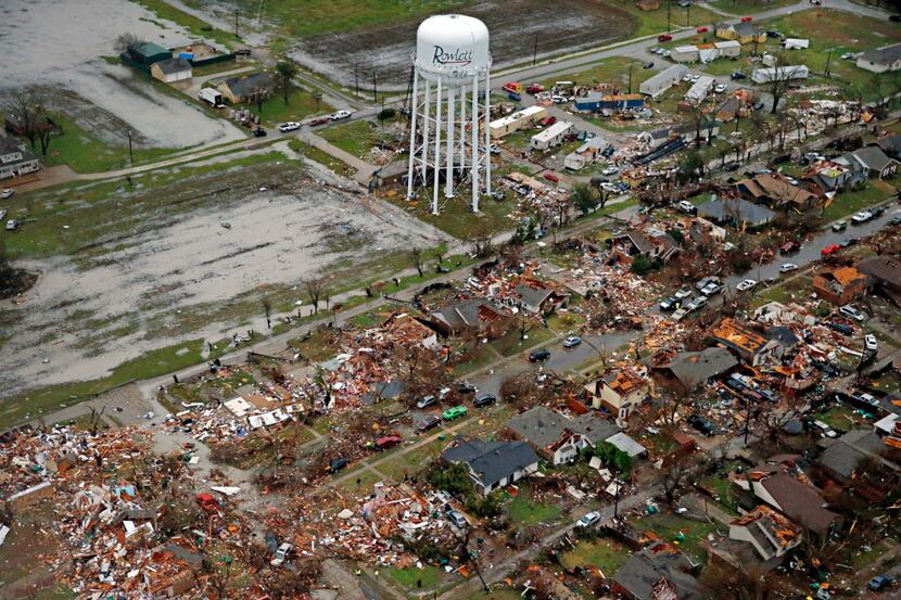  An aerial image taken Sunday, December 27, 2015 shows the path of a tornado in Rowlett,...