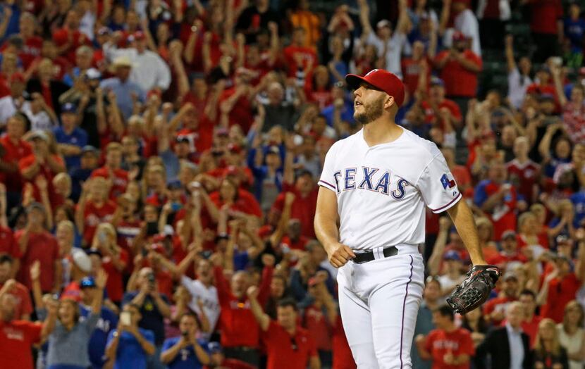 Texas Rangers relief pitcher Shawn Tolleson (37) reacts after getting a strikeout for the...