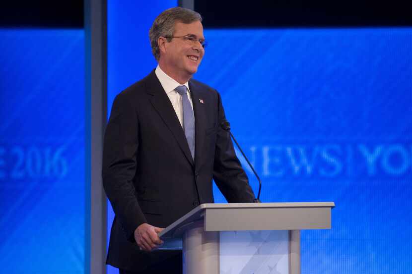 Jeb Bush, former governor of Florida and 2016 Republican presidential candidate, smiles...