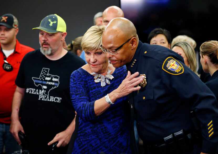 Fort Worth Police Chief Joel Fitzgerald received a hug from Mayor Betsy Price after a 2016...