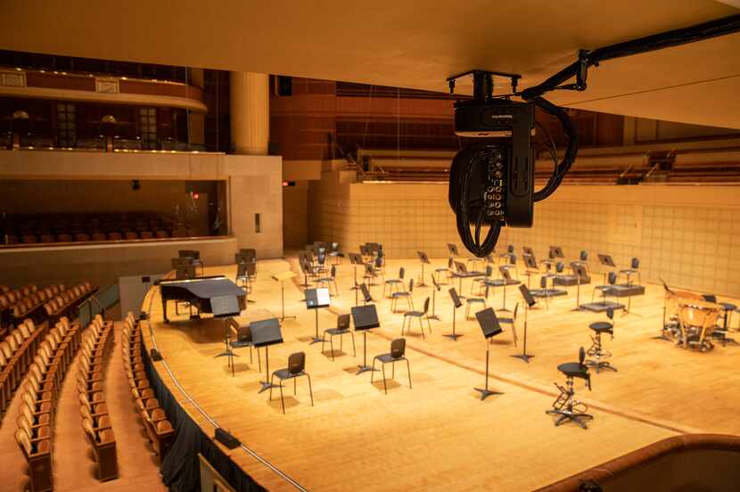 A shot of robotic cameras in the empty Eugene McDermott Concert Hall of the Morton H....