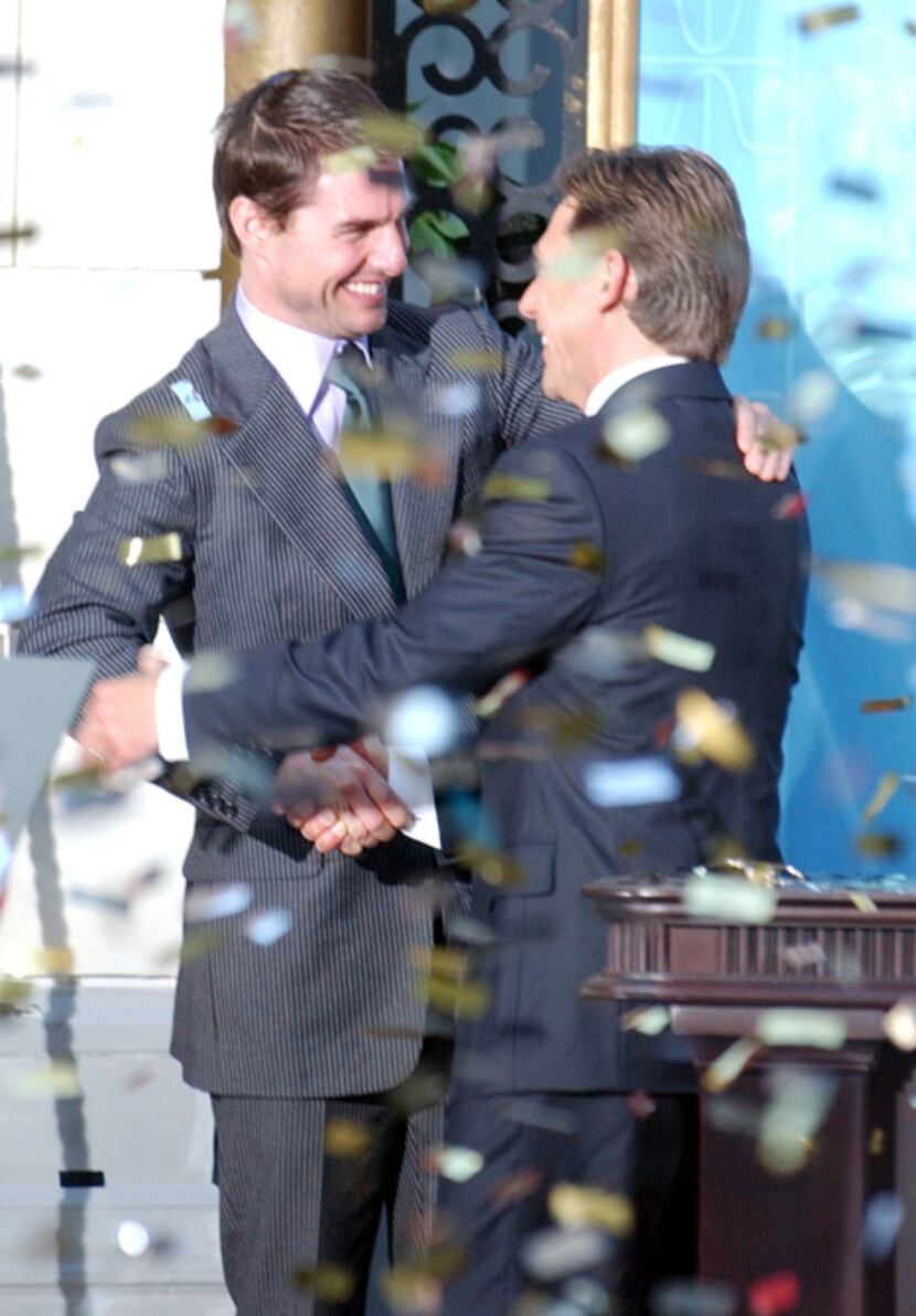 Tom Cruise, shown with the Church of Scientology's David Miscavige during the opening of a...