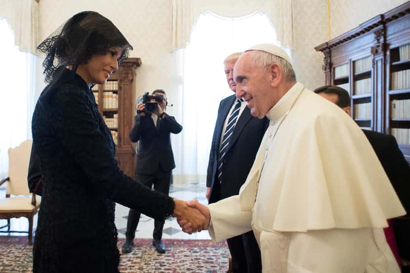Pope Francis shakes hands with First lady Melania Trump on the occasion of their private...