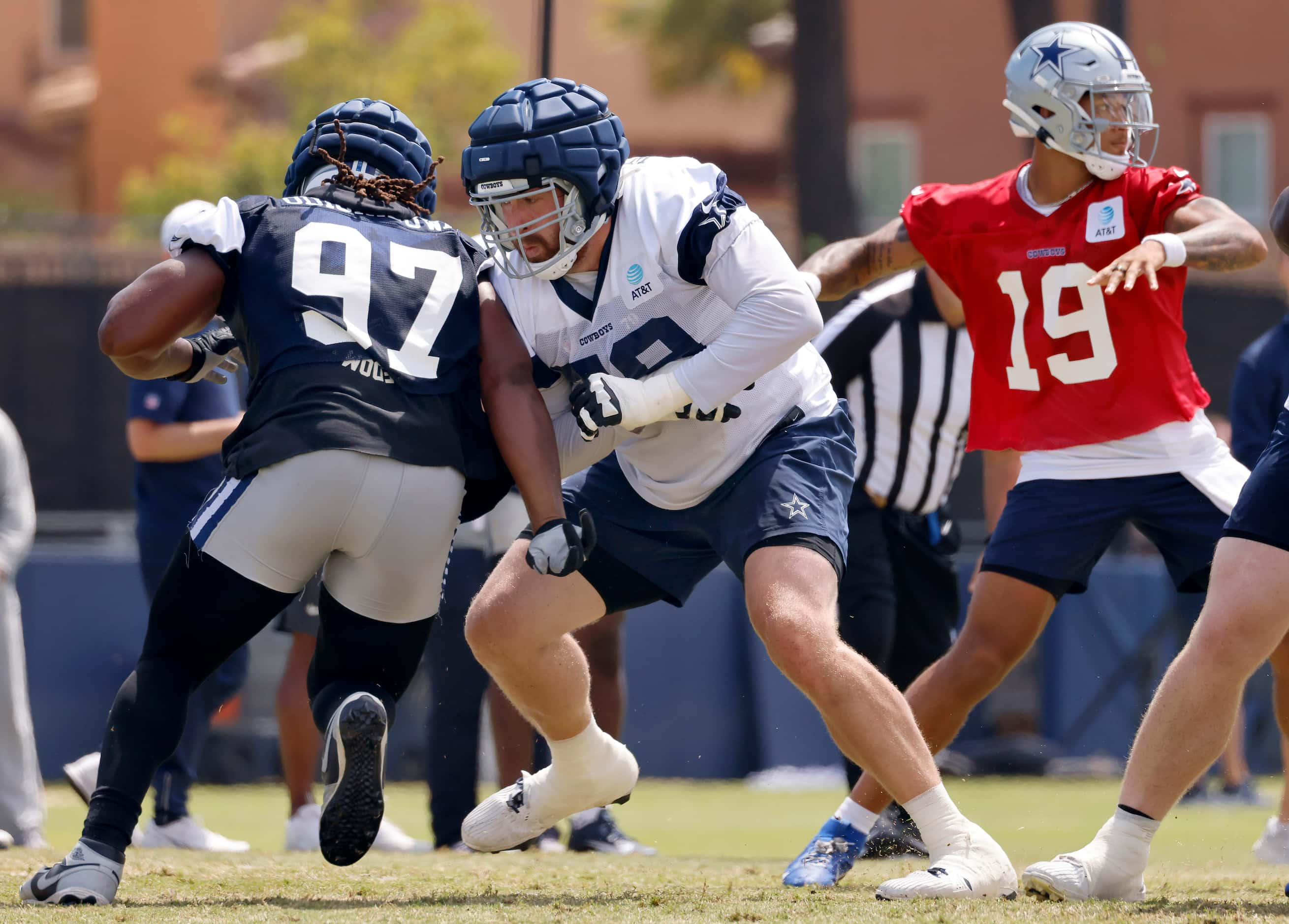 Dallas Cowboys offensive tackle Matt Waletzko (79) blocks defensive tackle Osa Odighizuwa...