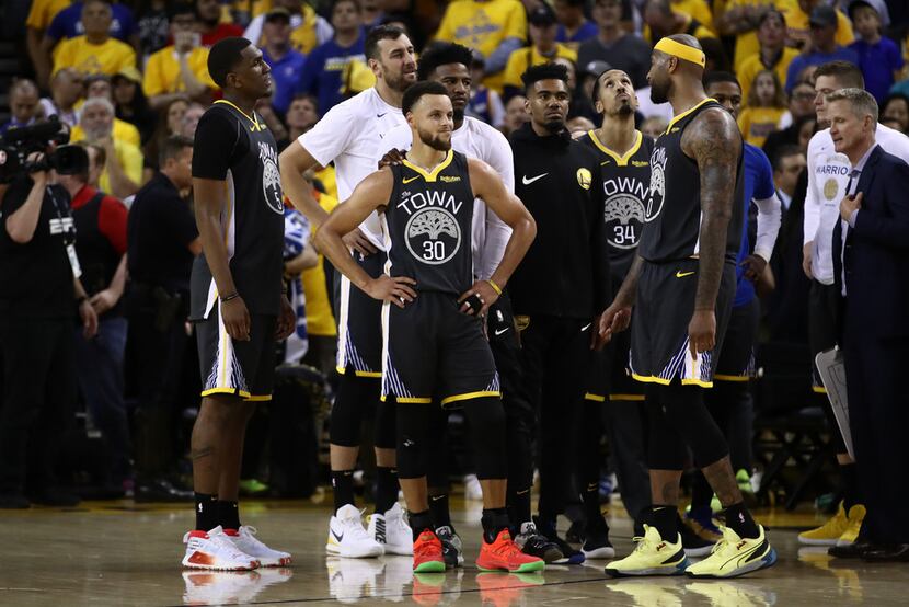 OAKLAND, CALIF. - JUNE 13:  Stephen Curry #30 of the Golden State Warriors reacts late in...