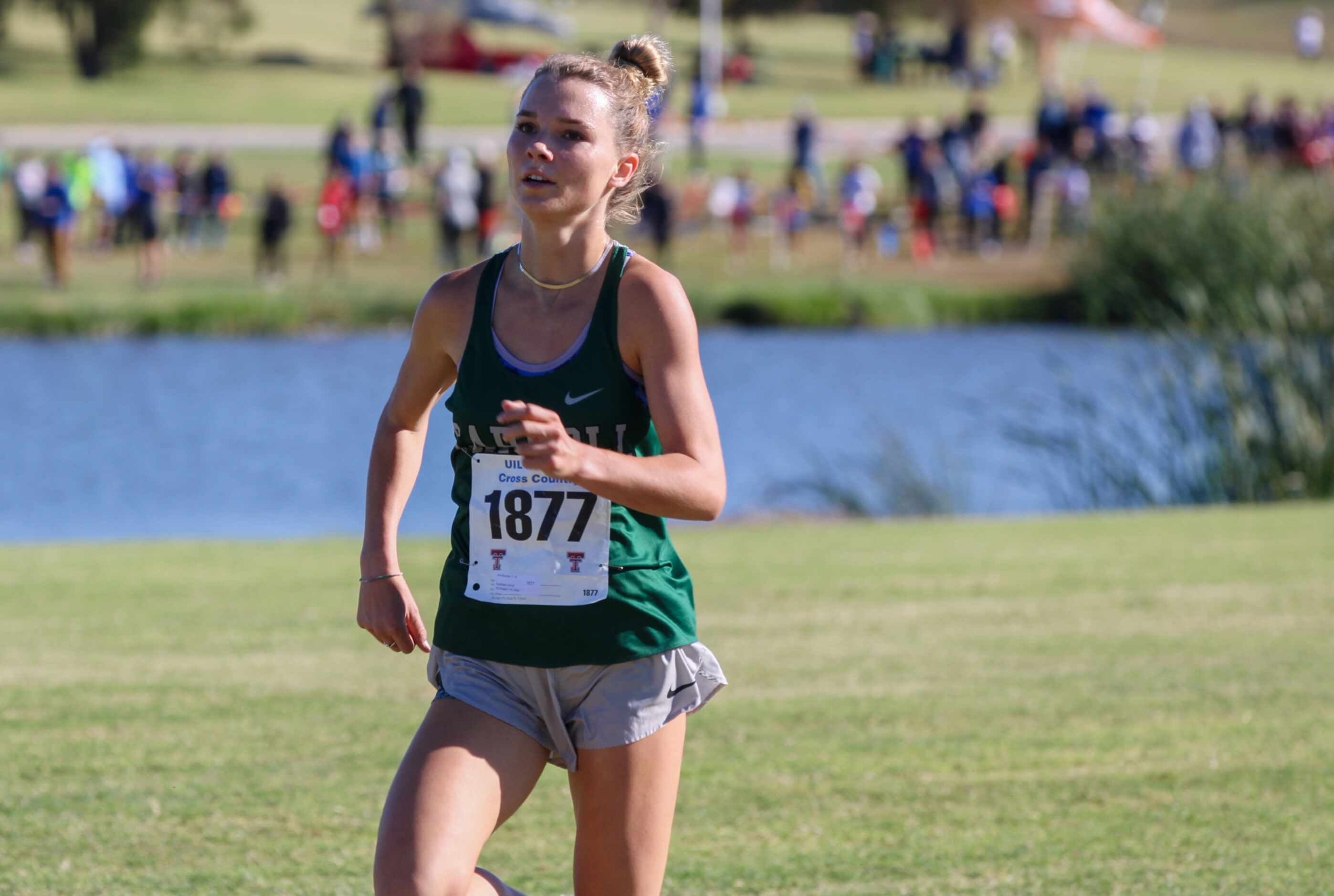 Southlake Carroll’s Ava Bushaw pulls ahead to take second in the Region I-6A girls cross...
