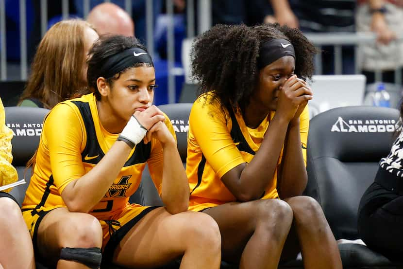 Frisco Memorial guard Wynter Jones (3) and Frisco Memorial guard Jasmyn Lott (10) are...