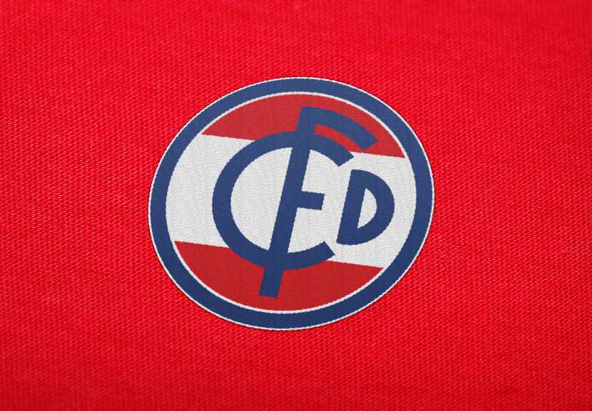 An FCD tri-letter logo on a shirt like material.