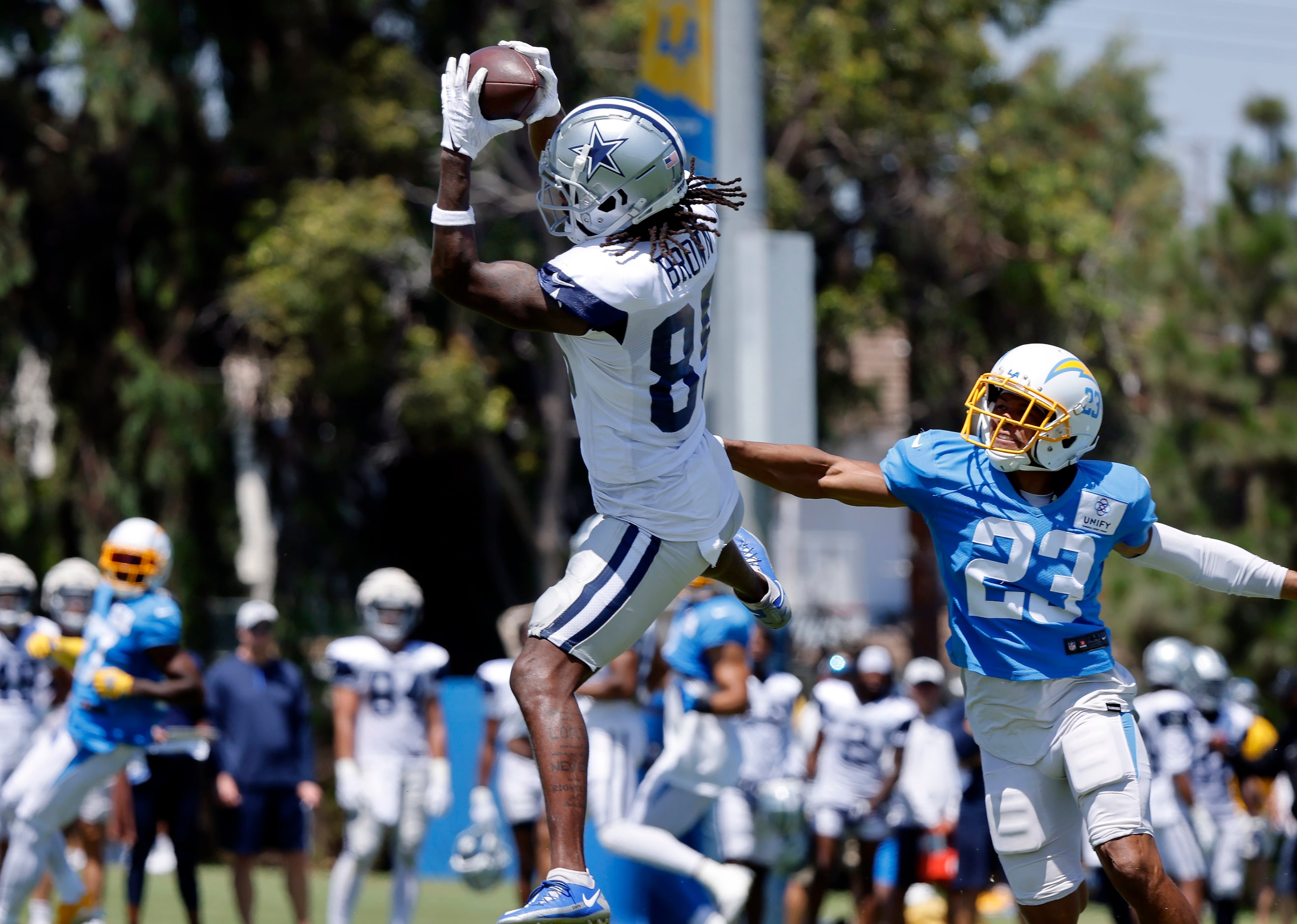 Dallas Cowboys wide receiver Noah Brown (85) pulls down a pass as he’s covered by Los...