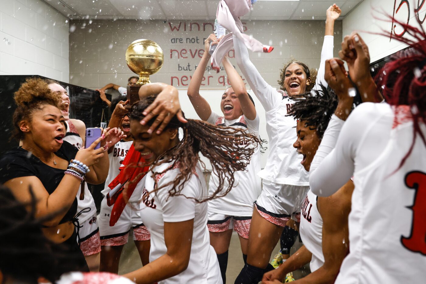 Braswell's Jazmyne Jackson, center, Yves Cox, right and Journey Taylor, front left,...