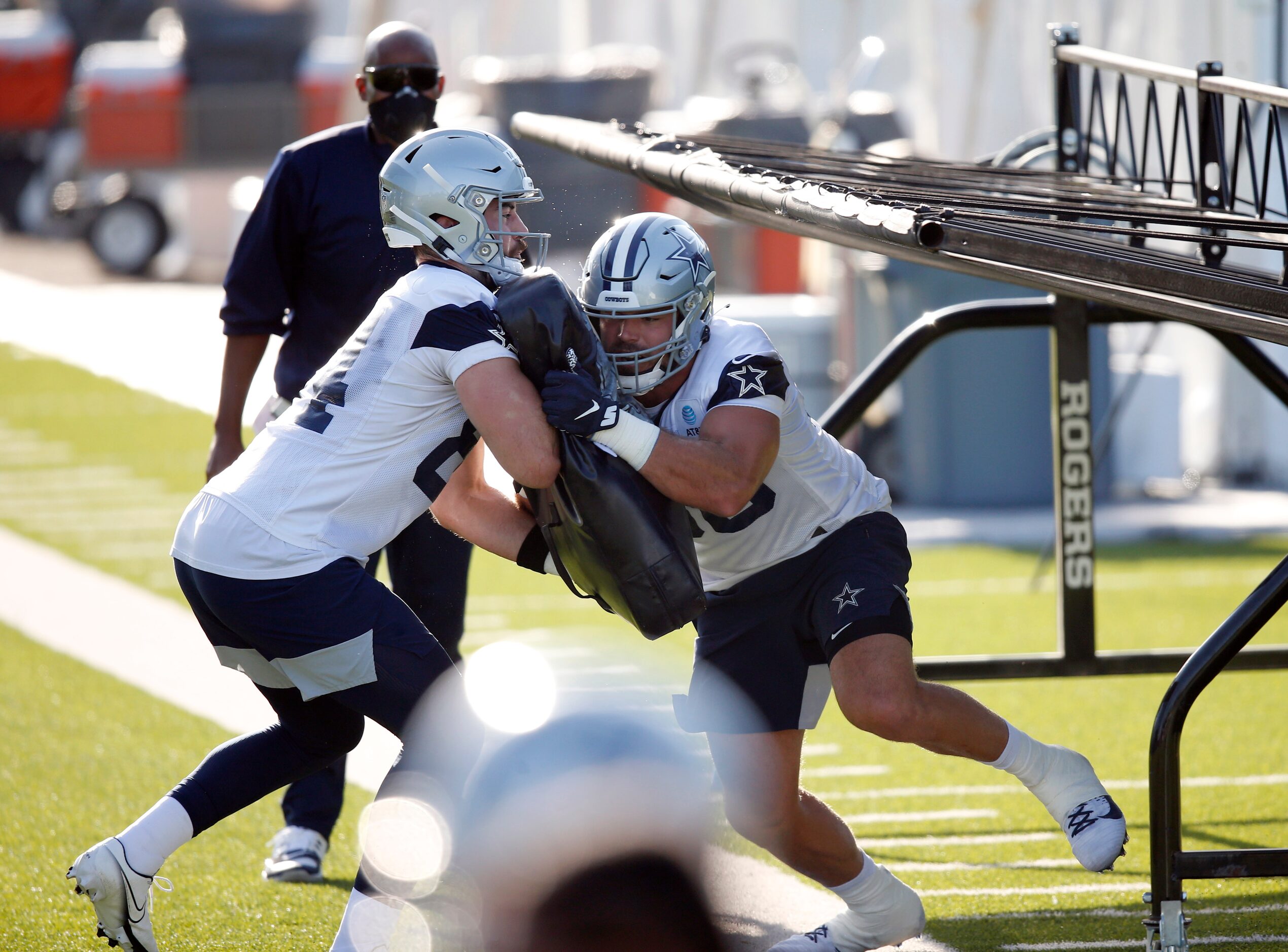 Dallas Cowboys tight end Blake Bell (80) attempts to run through Dallas Cowboys tight end...