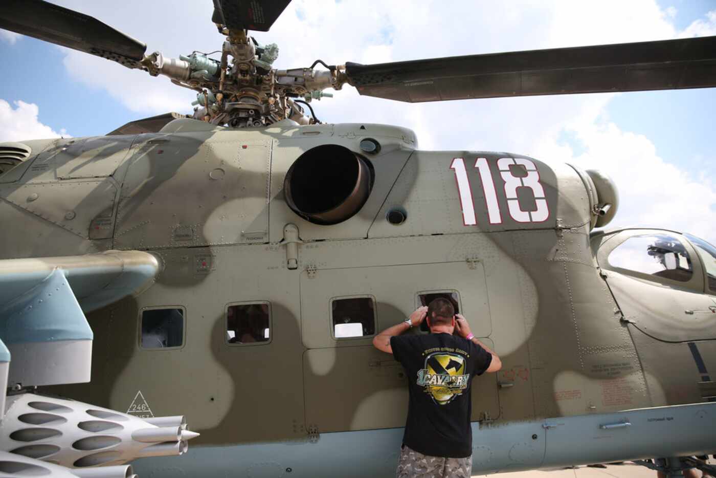 Andy Bass looks into a vintage Russian helicopter.