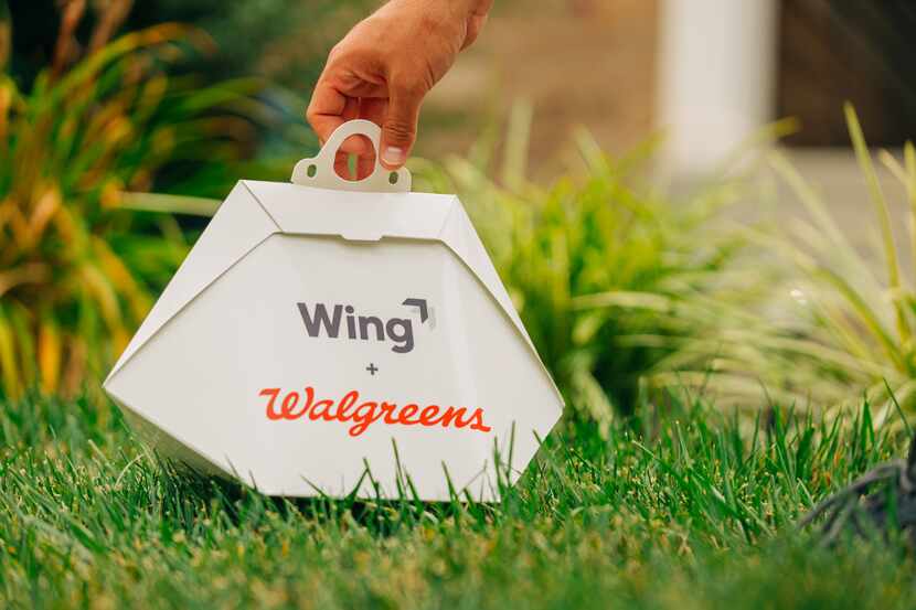 Customers chose on the Wing app where they want the drone to lower their purchase, front...