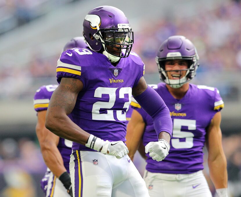 MINNEAPOLIS, MN - OCTOBER 14: George Iloka #23 of the Minnesota Vikings celebrates after...