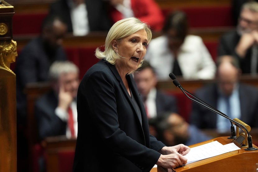 French far-right leader Marine Le Pen delivers her speech at the National Assembly prior to...