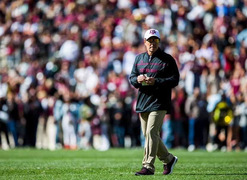 Texas A&M Aggies head coach Jimbo Fisher stands on the field during a Texas A&M University...