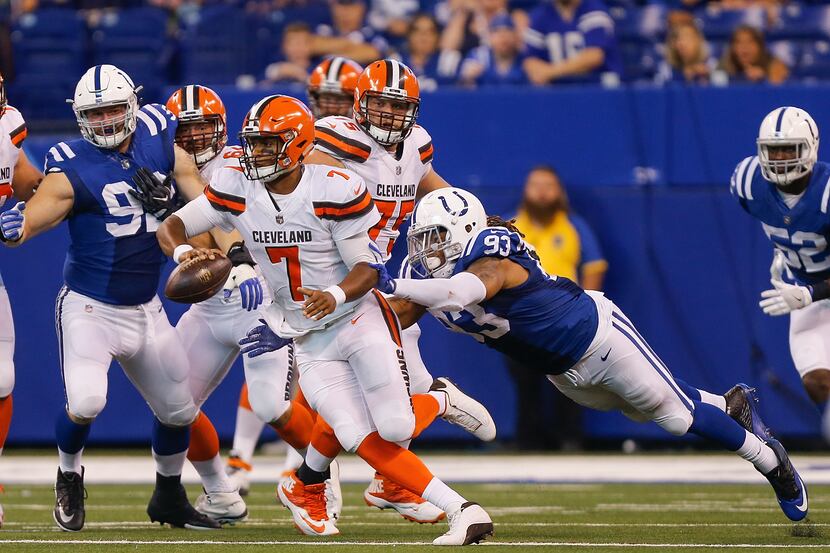 FILE - Jabaal Sheard #93 of the Indianapolis Colts tackles DeShone Kizer #7 of the Cleveland...