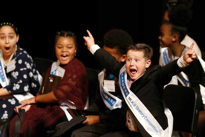 Fourth grader, Wesley Trent Stoker, of Harry C. Withers Elementary School reacts after being...