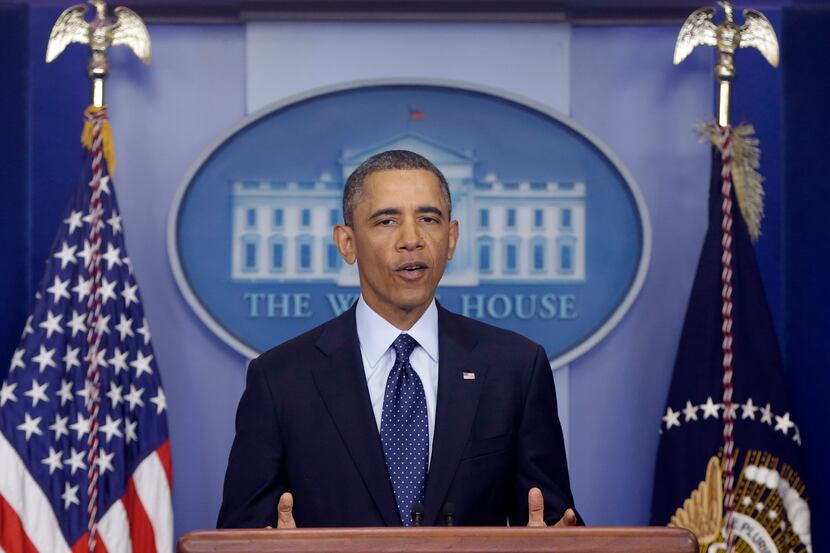 President Barack Obama speaks to reporters in the White House briefing room in Washington,...