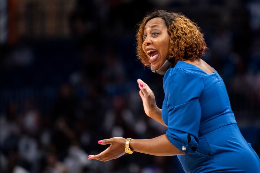 UT Arlington Head Coach Sherka Wright encourages her team from the sideline during UT...