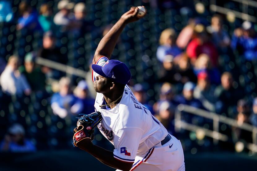 Rangers pitcher Demarcus Evans is pictured during the ninth inning of a spring training game...