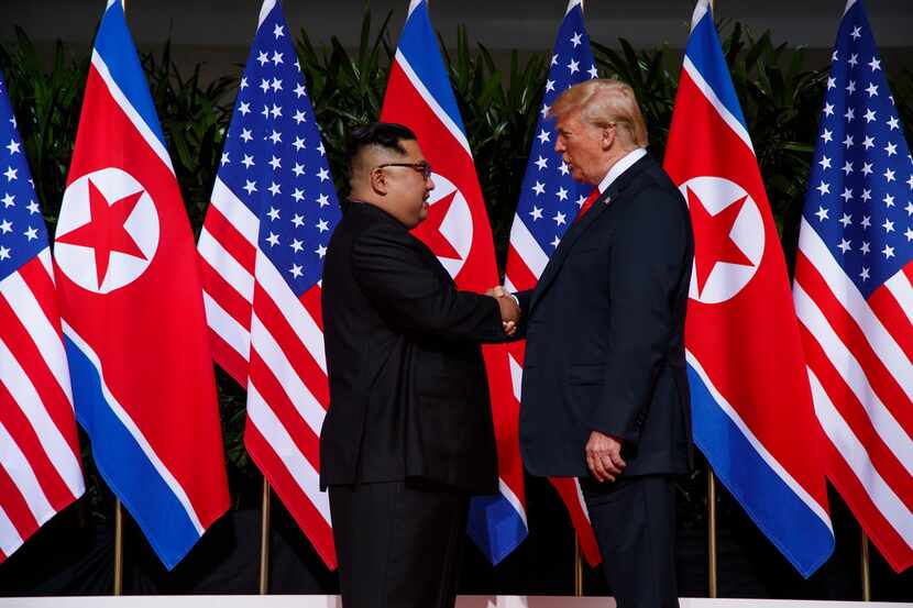 President Donald Trump meets with North Korean leader Kim Jong Un on Sentosa Island,...