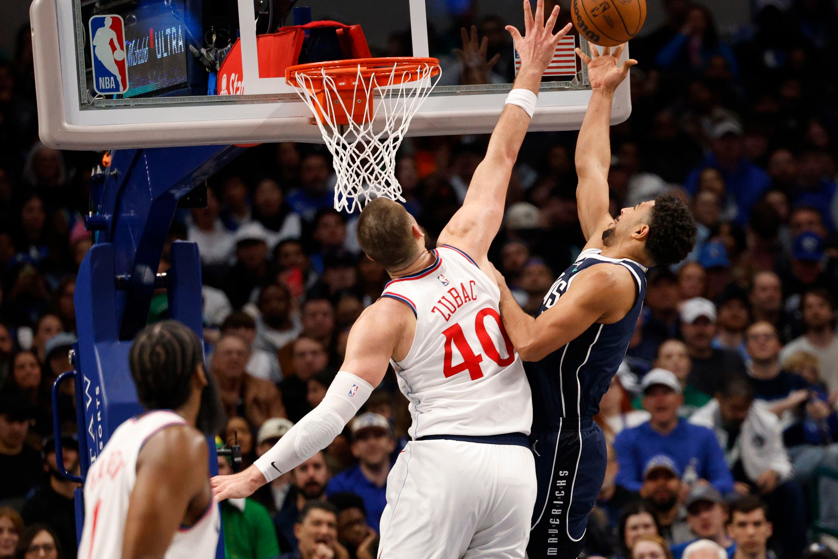 Dallas Mavericks guard Quentin Grimes (5) shoots over LA Clippers center Ivica Zubac (40)...