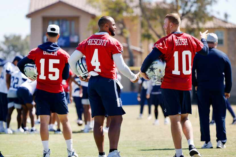 Dallas Cowboys quarterbacks Dak Prescott (4) and Cooper Rush (10) visit alongside Will Grier...