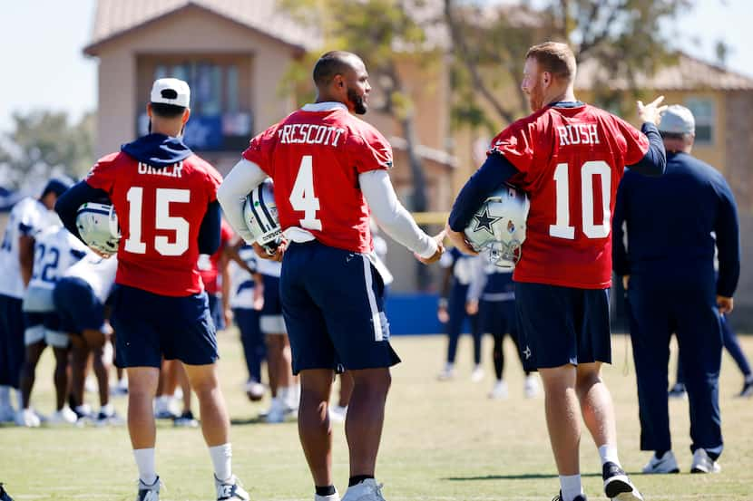 Dallas Cowboys quarterbacks Dak Prescott (4) and Cooper Rush (10) visit alongside Will Grier...