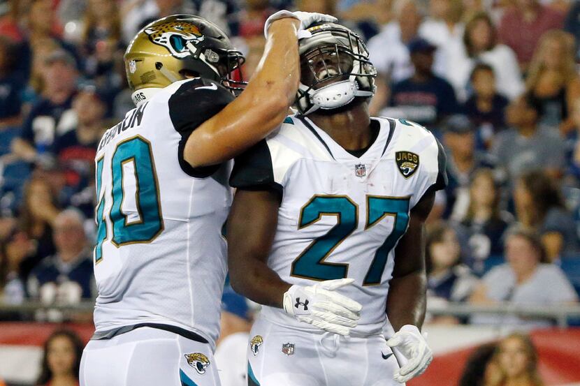 Jacksonville Jaguars running back Leonard Fournette (27) celebrates his touchdown against...